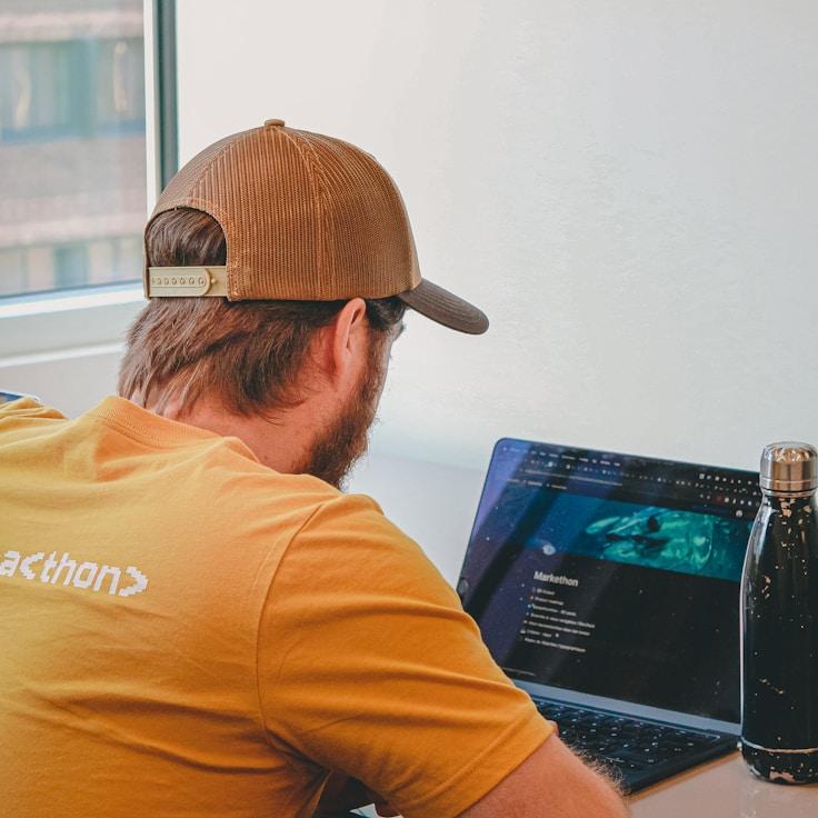 Mobile app project planning workspace with devices and development tools